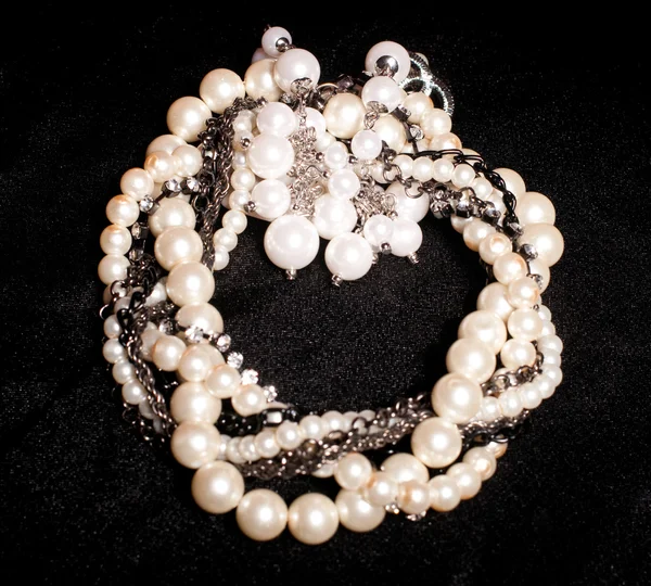 Pearl jewelry on black background — Stock Photo, Image