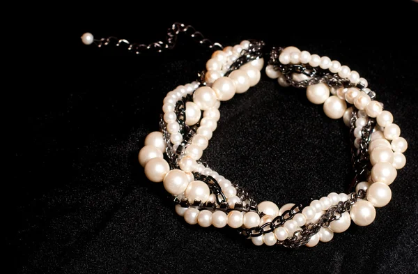 Pearl jewelry on black background — Stock Photo, Image