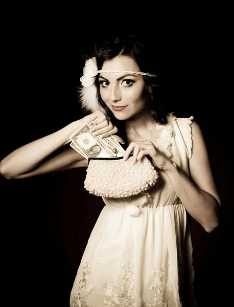 Vintage vrouw in retro jurk met dollars — Stockfoto