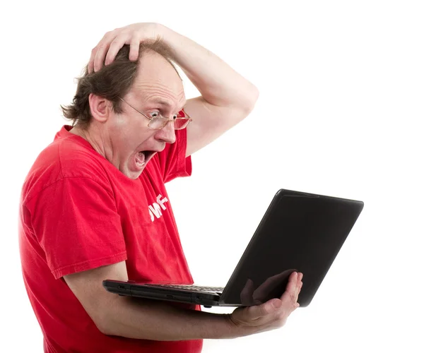 Ouderen verrast man met laptop — Stockfoto