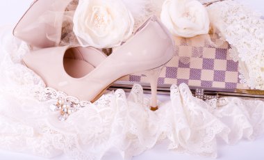 The beautiful bridal shoes, lace and beads clipart