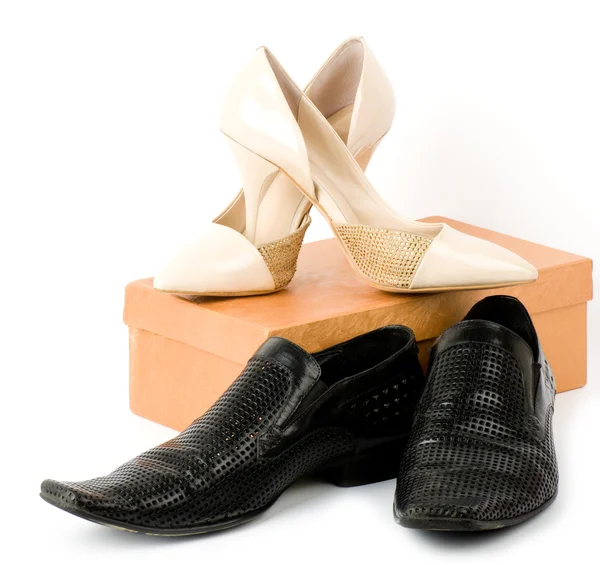 Módní mužské a ženské boty izolovaných na bílém pozadí. — Stock fotografie