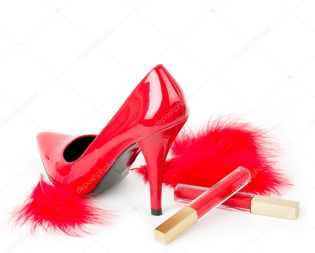 Sexy fashionable shoe and red lipstick on white background.