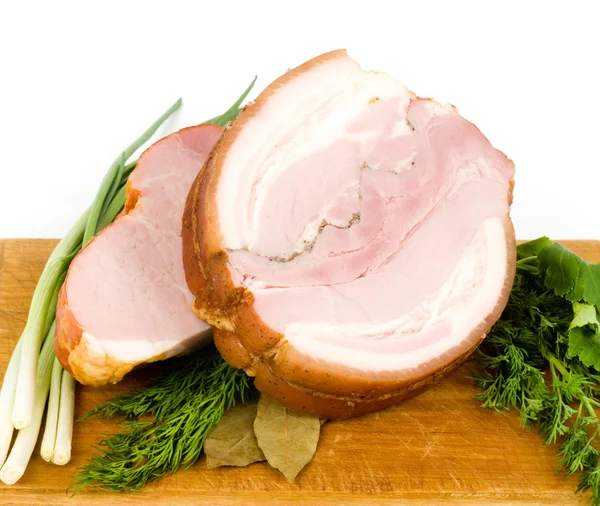 stock image Ham on wooden platter with spices