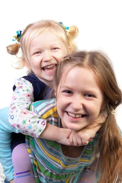 Two sisters embracing — Stock Photo, Image