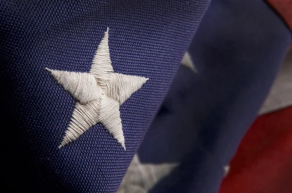 Primer plano de una estrella en una bandera de Estados Unidos — Foto de Stock