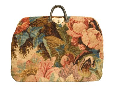 Antique carpetbag with a flower pattern clipart
