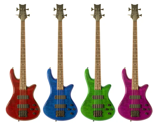 Многоцветные бас-гитары — стоковое фото