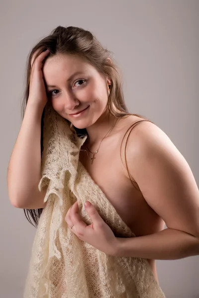 Girl covers bare breasts shawl — Stock Photo, Image