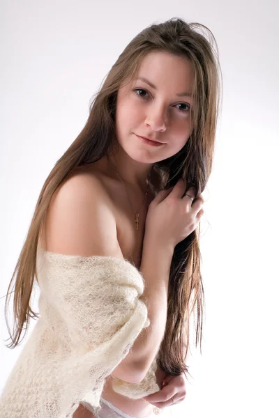Girl covers bare breasts shawl — Stock Photo, Image