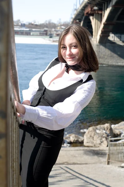 Business woman on the city's waterfront — Stock Photo, Image