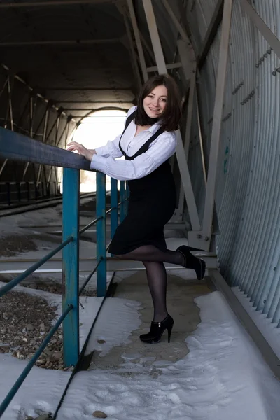 Business woman in a railway tunnel — Stock Photo, Image