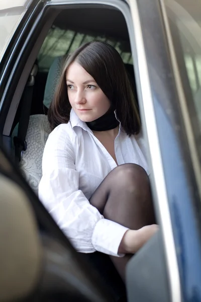 Obchodní žena v autě — Stock fotografie
