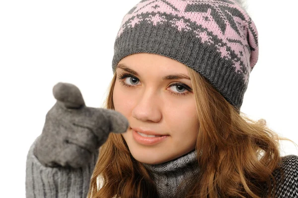 Girl in a cap pointing at you — Stock Photo, Image