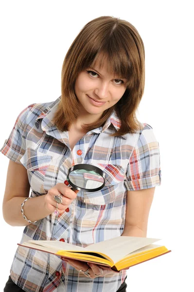 Eye and magnifying glass and book — Stock Photo, Image