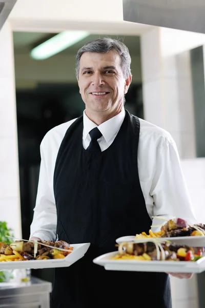 Male chef presenting food — Stock Photo, Image