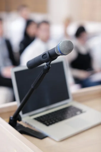 Laptop on conference speech podium — Stock Photo, Image