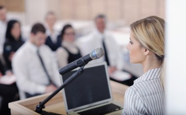 Business woman giving presentation clipart