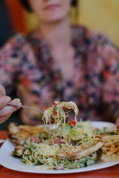 stock image Woman eat salad