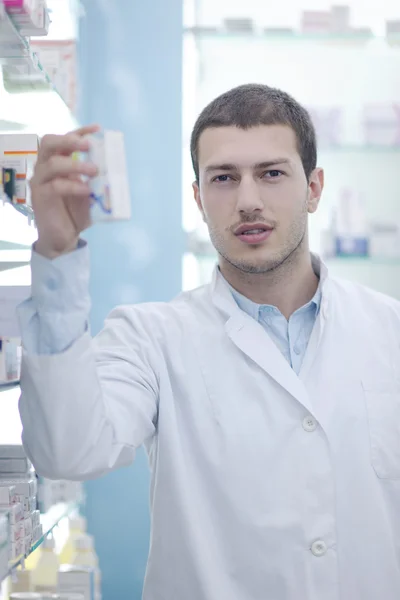 Pharmacist chemist man in pharmacy drugstore — Stock Photo, Image