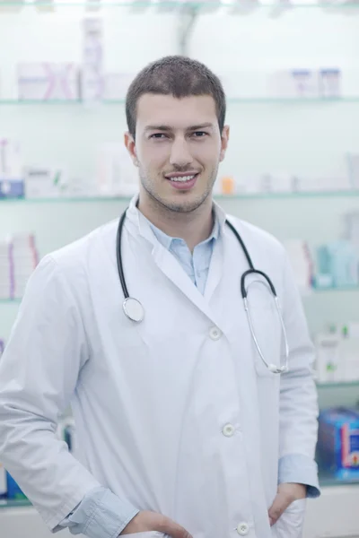 Pharmacist chemist man in pharmacy drugstore — Stock Photo, Image