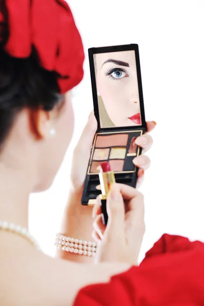Beautiful young woman applying makeup — Stock Photo, Image