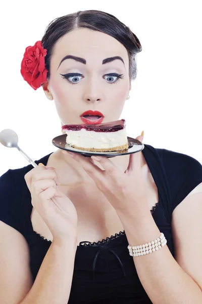 Ganska ung glad kvinna äta tårta — Stockfoto