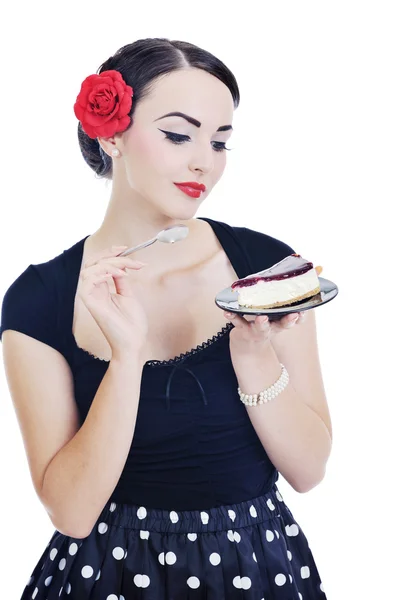 Hübsche junge glückliche Frau isst Kuchen — Stockfoto