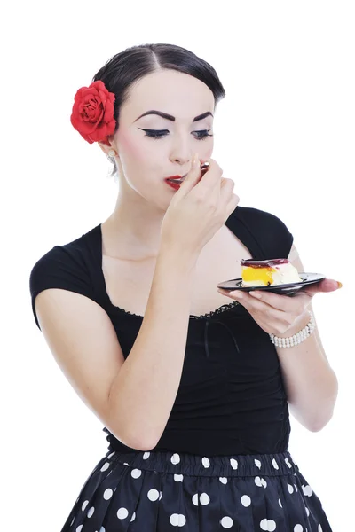 Όμορφη νεαρή γυναίκα να φάω γλυκό κέικ — Φωτογραφία Αρχείου