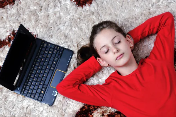 Happy school girl relaxing at home — Stock Photo, Image
