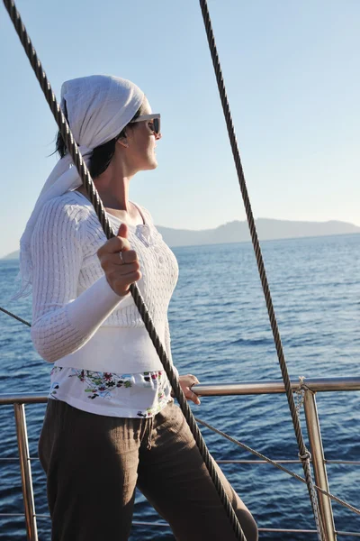 stock image Greek woman on the streets of Oia, Santorini, Greece