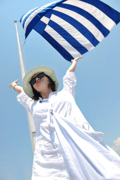 Greek woman on the streets of Oia, Santorini, Greece — Stock Photo, Image