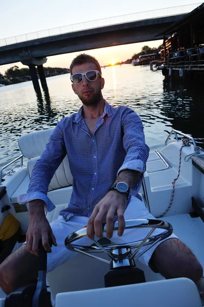 Portrait of happy young man on boat — Stock Photo, Image