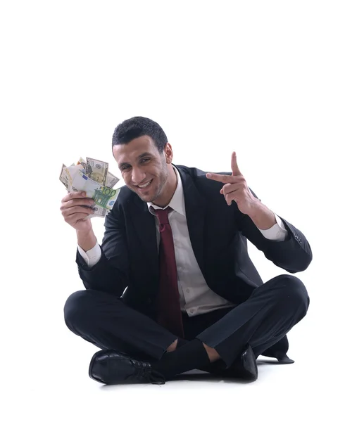 Homem de negócios segurando dinheiro — Fotografia de Stock