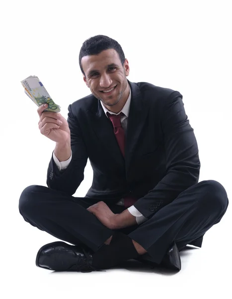 Hombre de negocios sosteniendo dinero —  Fotos de Stock