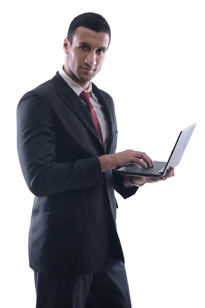 Ο άνθρωπος των επιχειρήσεων που λειτουργούν σε μίνι φορητό υπολογιστή — Φωτογραφία Αρχείου