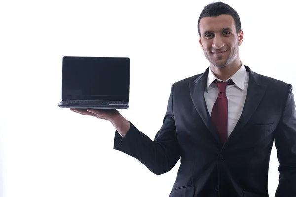 Biznes człowiek działa na mini-laptopa — Zdjęcie stockowe