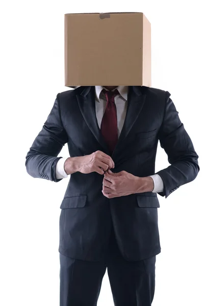 Деловой человек с коробкой на голове — стоковое фото