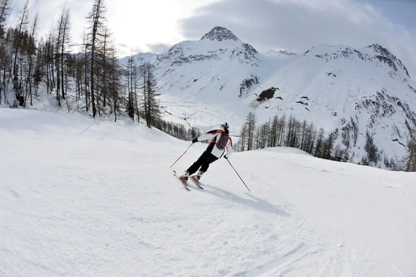 Skiing on fresh snow at winter season at beautiful sunny day — Stock Photo, Image