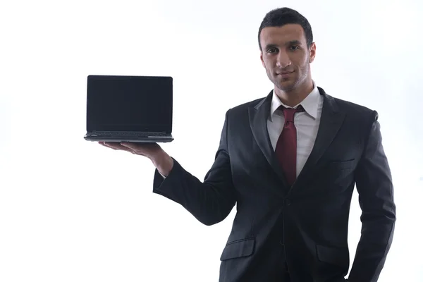 Бізнесмен працює на міні ноутбуці — стокове фото