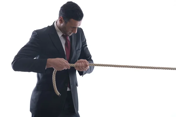 Hombre de negocios con cuerda aislada sobre fondo blanco —  Fotos de Stock