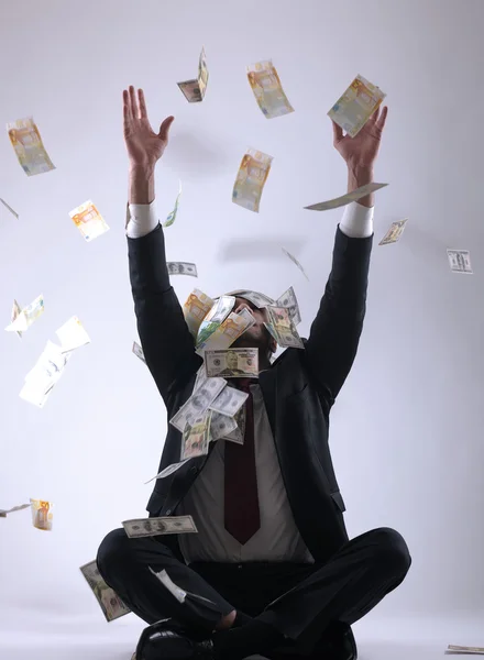 Geschäftsmann im Besitz von Geld — Stockfoto