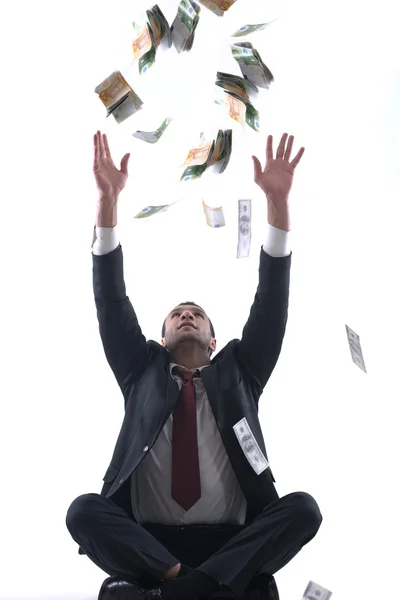 Hombre de negocios sosteniendo dinero — Foto de Stock