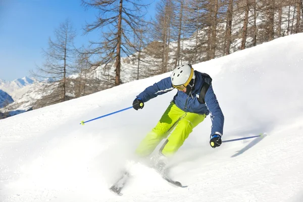 Skiing on fresh snow at winter season at beautiful sunny day — Stock Photo, Image