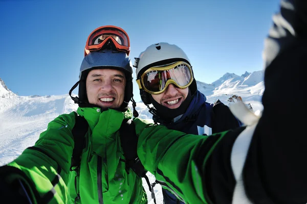Winter portrait of friends at skiing — Stock Photo, Image