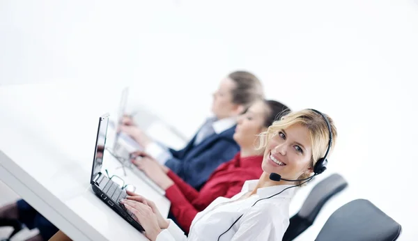 Grupo de mujeres de negocios con auriculares — Foto de Stock