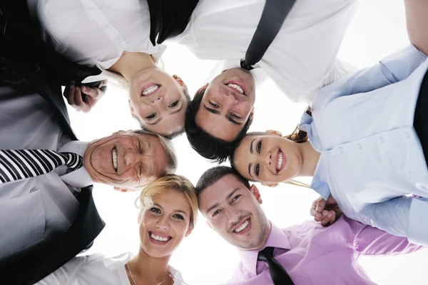 Business with their heads together — Stock Photo, Image