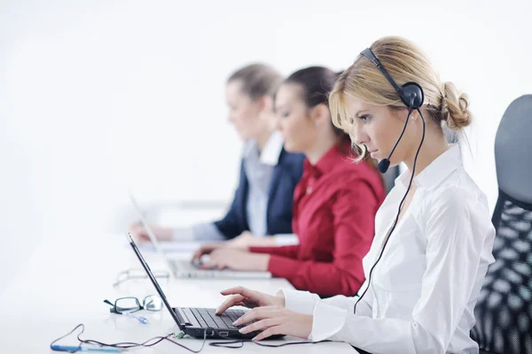 Business woman group with headphones — Stock Photo, Image