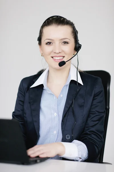 Business woman group with headphones — Stock Photo, Image