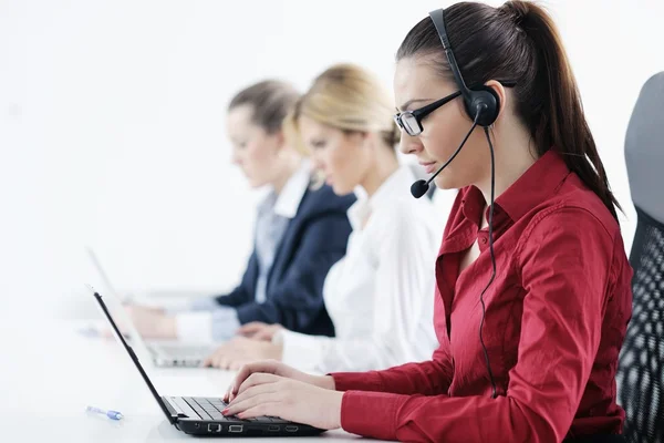 Grupo de mujeres de negocios con auriculares — Foto de Stock